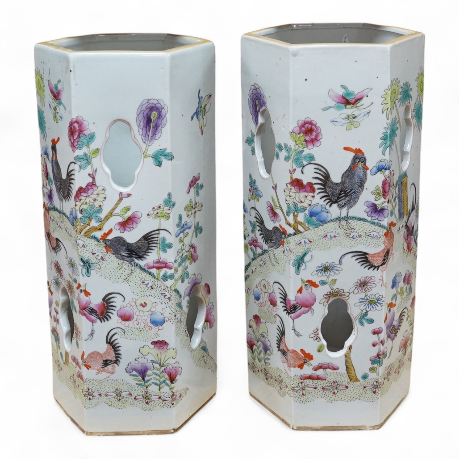 A pair of hexagonal Chinese famille rose porcelain hat stands, 30cm high